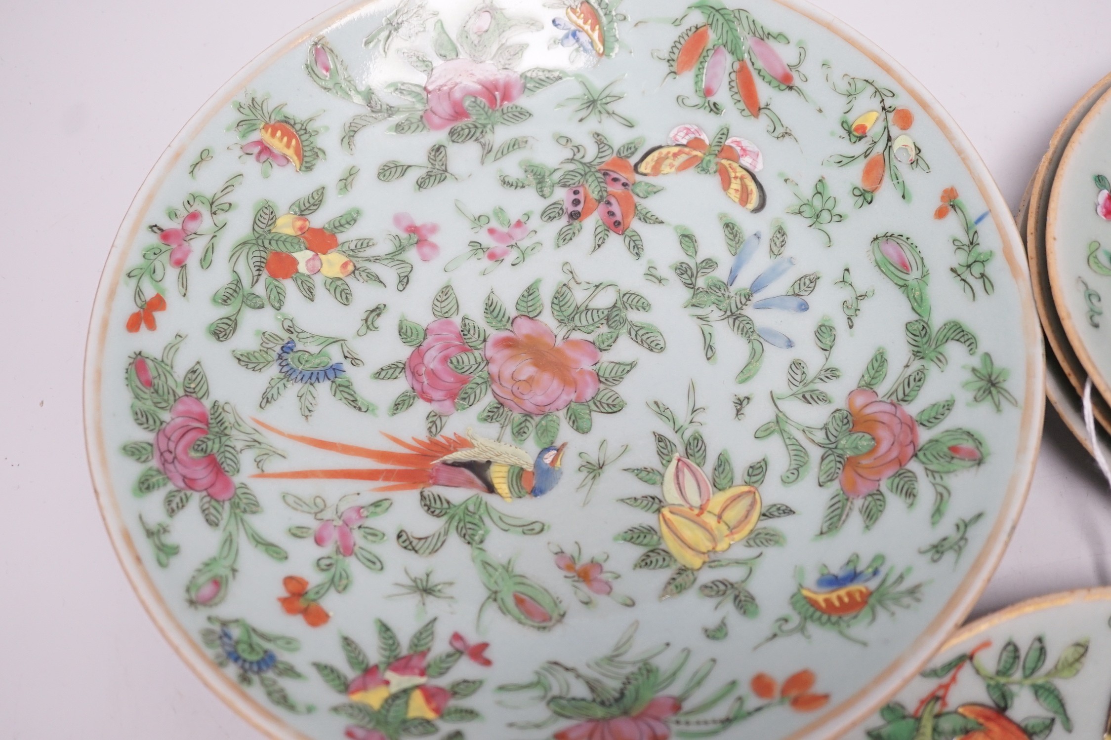 Five 19th century Chinese celadon glazed famille rose dishes, largest 23.5 cm